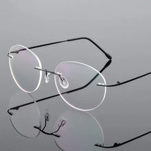 Load image into Gallery viewer, Female Rimless Folding Glasses Frame Man Women Titanium Alloy Ultralight Oval Prescription Myopia Optical Eyeglasses Frames