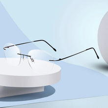 Load image into Gallery viewer, Female Rimless Folding Glasses Frame Man Women Titanium Alloy Ultralight Oval Prescription Myopia Optical Eyeglasses Frames