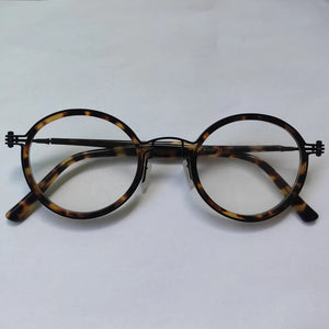 Montatura per occhiali retrò rotonda in acetato di titanio cavo fatta a mano giapponese per uomo donna montatura per occhiali miopia con prescrizione ottica