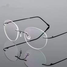 Load image into Gallery viewer, Retro Round Foldable Ultra-light Memory Titanium Alloy Myopia Eyeglasses Rimless Elasticity Optical Glasses Frame Men Eyewear