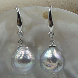 11-12mm Similar Baroque natural furrow cultured gr pearl earring dangle