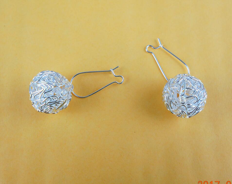 2017 Wholesale Korean Earrings Fashion Cute Personality Hollow Ball Earrings
