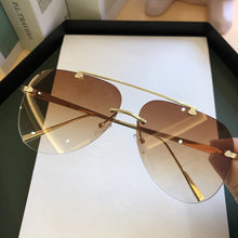 Load image into Gallery viewer, 2023     Designer Oval Rimless SunglassesSummer Glasses Sun glasses For Men Women UV400 Sunglasses