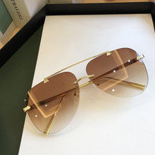 Load image into Gallery viewer, 2023     Designer Oval Rimless SunglassesSummer Glasses Sun glasses For Men Women UV400 Sunglasses