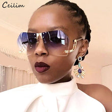 Load image into Gallery viewer, 2023 nuevo Irregular sin montura gafas de sol mujer marca diseñador Marco de aleación de gran tamaño de gafas de sol de moda de mujer gafas de sol transparentes