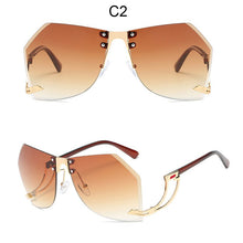 Load image into Gallery viewer, 2023 nuevo Irregular sin montura gafas de sol mujer marca diseñador Marco de aleación de gran tamaño de gafas de sol de moda de mujer gafas de sol transparentes