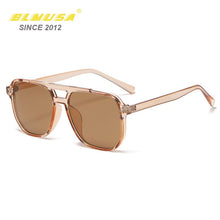Carica l&#39;immagine nel visualizzatore di Gallery, BLMUSA 2023 Occhiali da sole semplici da uomo Tendenza lenti sfumate Occhiali decorativi quadrati per le donne Occhiali da guida per auto unisex UV400