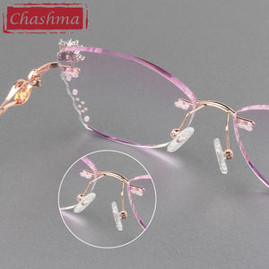 Occhiali da vista femminili a farfalla Titanio grigio lente rossa Montature per occhiali senza montatura con taglio a diamante Occhiali da sole da donna Lenti colorate