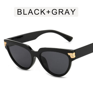 Cat-eye rivet sunglasses European and American INS triangle sunglasses women 2023 trend jelly colored glasses