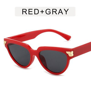 Cat-eye rivet sunglasses European and American INS triangle sunglasses women 2023 trend jelly colored glasses