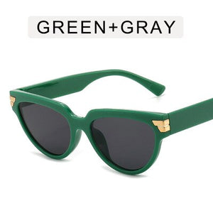Cat-eye rivet sunglasses European and American INS triangle sunglasses women 2023 trend jelly colored glasses