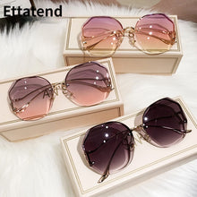 Carica l'immagine nel visualizzatore di Gallery, Ettatend 2023 Rimless Sunglasses Women Ocean Lens Metal Curved Temples Sun Glasses Vintage Shades for Female UV400