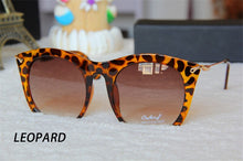 Load image into Gallery viewer, Colored Half Frame Cat Eye Sunglasses Women 2023 Brand Style Metal Frame Eyeglasses Trend UV400 Oculos De Sol Gafas