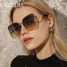 Load image into Gallery viewer, Rimless Square Sunglasses Women Men Diamond Sun Glasses Blue Tea Eyewear Female  Brand Eyeglasses UV400 Oculos