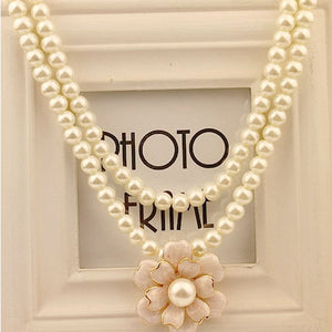 Fashion pearl pendant necklace short section of female Korean daisy small fresh sweet camellia flowers clavicle jewelry pendant