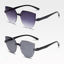 Carica l&#39;immagine nel visualizzatore di Gallery, Frameless One-piece Jelly Transparent Sunglasses European and American Candy-colored Cat Eye Integrated Ocean Sunglasses