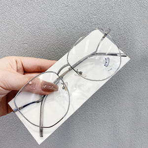 Transparent Eyeglasses Frames for Women Computer Blue Light Glasses Frame Ladies Irregular Curved Legs Metal Spectacles