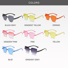 Carica l&#39;immagine nel visualizzatore di Gallery, Frameless One-piece Jelly Transparent Sunglasses European and American Candy-colored Cat Eye Integrated Ocean Sunglasses