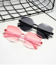 Carica l&#39;immagine nel visualizzatore di Gallery, Frameless One-piece Jelly Transparent Sunglasses European and American Candy-colored Cat Eye Integrated Ocean Sunglasses