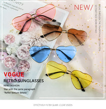 Load image into Gallery viewer, WUE Ladies Heart Shaped Sunglasses metal Women Brand Designer Fashion Rimless LOVE Clear Ocean Lenses Sun Glasses Oculos UV400
