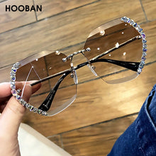 Load image into Gallery viewer, HOOBAN 2023 Rhinestone  Sunglasses Women Vintage Rimless Crystal Sun Glasses Female  Diamond Eyewear Shade