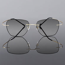 Load image into Gallery viewer, Gmei Optical Golden Titanium Alloy Men&#39;s Rimless Glasses Frame With Gradient Grey Tint Plano Lenses And Black Border Q90010