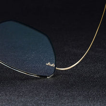 Load image into Gallery viewer, Gmei Optical Golden Titanium Alloy Men&#39;s Rimless Glasses Frame With Gradient Grey Tint Plano Lenses And Black Border Q90010