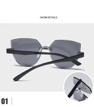 Carica l&#39;immagine nel visualizzatore di Gallery, Frameless One-piece Jelly Transparent Sunglasses European and American Candy-colored Cat Eye Integrated Ocean Sunglasses