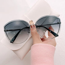 Carica l'immagine nel visualizzatore di Gallery, High Quality women's Oval Rimless Sunglasses Lady Metal Cay Eye Shades for Women Driving Glasses Sonnenbrille zonnebril dames