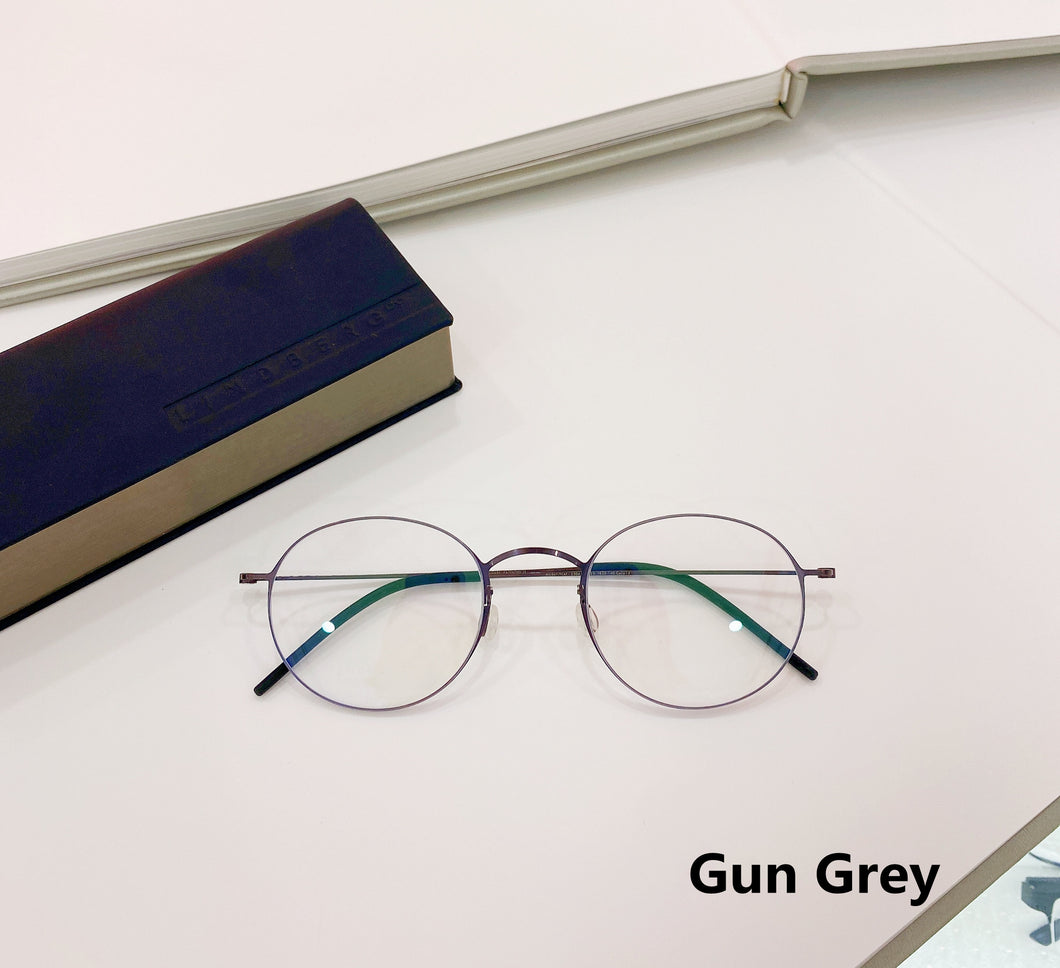 Alta qualità Danimarca Design del marchio Occhiali miopia Occhiali da vista Montatura da uomo Ultraleggera senza viti Rotonda Filo d'oro Montatura in titanio puro