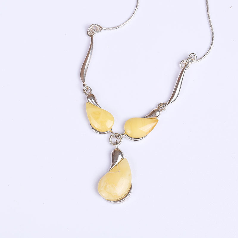 Handmade original design 925 sterling silver amber beeswax pendant necklace Poland fashion Europe and the United States