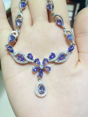 Collana con tanzanite blu naturale Collana con pendente in pietra preziosa naturale S925 da donna in nastro di lusso alla moda Fiori per feste di alta gioielleria 
