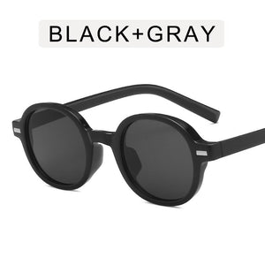 Oulylan Occhiali da sole ovali neri classici per le donne Occhiali da sole rotondi alla moda da uomo Occhiali da guida all'aperto Occhiali sfumati UV400 