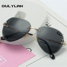 Carica l&#39;immagine nel visualizzatore di Gallery, Oulylan Rimless Sunglasses Women Brand Designer Sun Glasses Gradient Shades Cutting Lens Ladies Frameless Metal Eyeglasses UV400