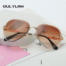 Carica l&#39;immagine nel visualizzatore di Gallery, Oulylan Rimless Sunglasses Women Brand Designer Sun Glasses Gradient Shades Cutting Lens Ladies Frameless Metal Eyeglasses UV400