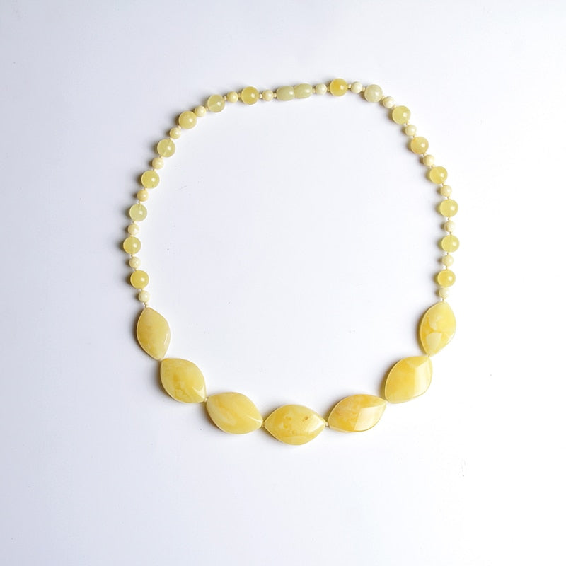 Pure natural chicken oil yellow bee wax amber with the shape of irregular necklace no pendant big sweater chain to send bracelet