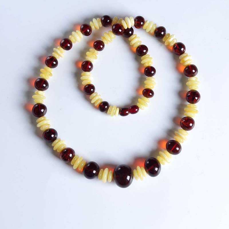 Pure natural chicken oil yellow honey wax men and women with the shape of water droplets sweater chain Duobao amber necklace