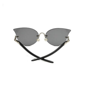 Retro frameless men sunglasses cat eye metal cross - border sunglasses female American hipster ocean sunglasses glasses