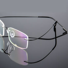 Load image into Gallery viewer, Superelastic Steel Wire Frameless Glasses Ultra-light Rimless Memory Titanium Eyeglasses