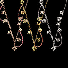 Carica l&#39;immagine nel visualizzatore di Gallery, Titanium steel necklace wholesale V four leaf flower double chain necklace women&#39;s foreign trade multi accessories chain necklac
