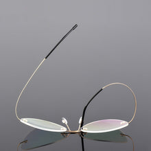 Carica l&#39;immagine nel visualizzatore di Gallery, Ultra-light Memory Cats Eye Frameless Titanium Alloy Eyeglass Optical Rx Frames Rimless Eyeglasses Women Cat Eye Glasses