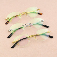 Load image into Gallery viewer, Ultralight titanium glasses frame women Rimless glasses frame men eyeglasses frames men Frameless spectacle frames Women CT0038S