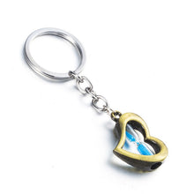 Carica l&#39;immagine nel visualizzatore di Gallery, Unique gun colt weapon shaped pendant necklace jewelry Trendy love heart hourglass rope chain keychain trinket jewelery toka