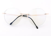 Load image into Gallery viewer, Women Round Rimless Glasses Frame Men Anti Blue Light Computer Eyeglass Frames Vintage Fashionable Lightweight Red Blue Eyewear