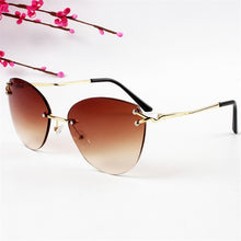 Carica l'immagine nel visualizzatore di Gallery, YOOSKE 2023 Cat Eye Sunglasses Women  Brand Gradient Rimless Sun Glasses Ladies Ocean Diamond Cutting Lens Shade Eyewear